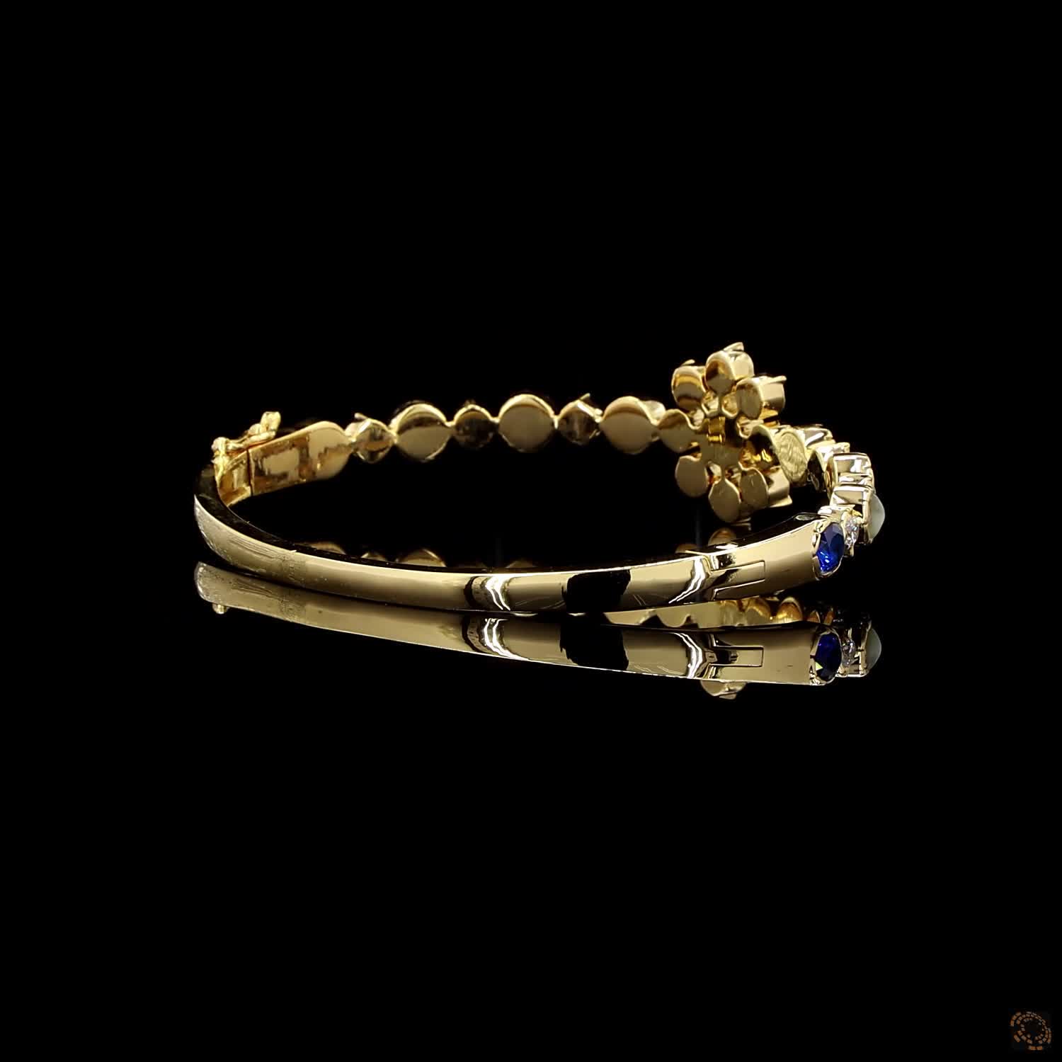Navratna Stone Diamond Bracelet in 18KT Yellow Gold
